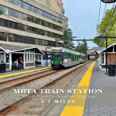 MBTA Brookline Village Green Line stop near 58 Kent Street; offering residents quick transit access to downtown Boston, ideal for commuters seeking luxury living in a walkable Brookline location.